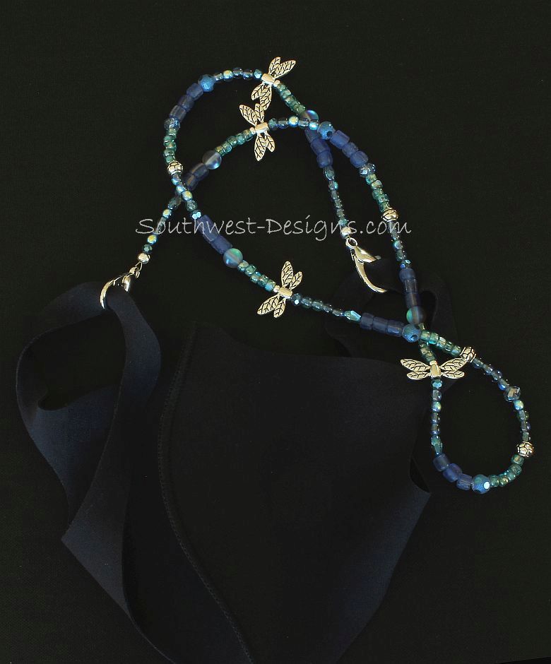 Indonesian Glass and Czech Glass Mask Lanyard with Blue Crystal Rounds and Plated Silver Dragonflies and Ornate Drum Beads